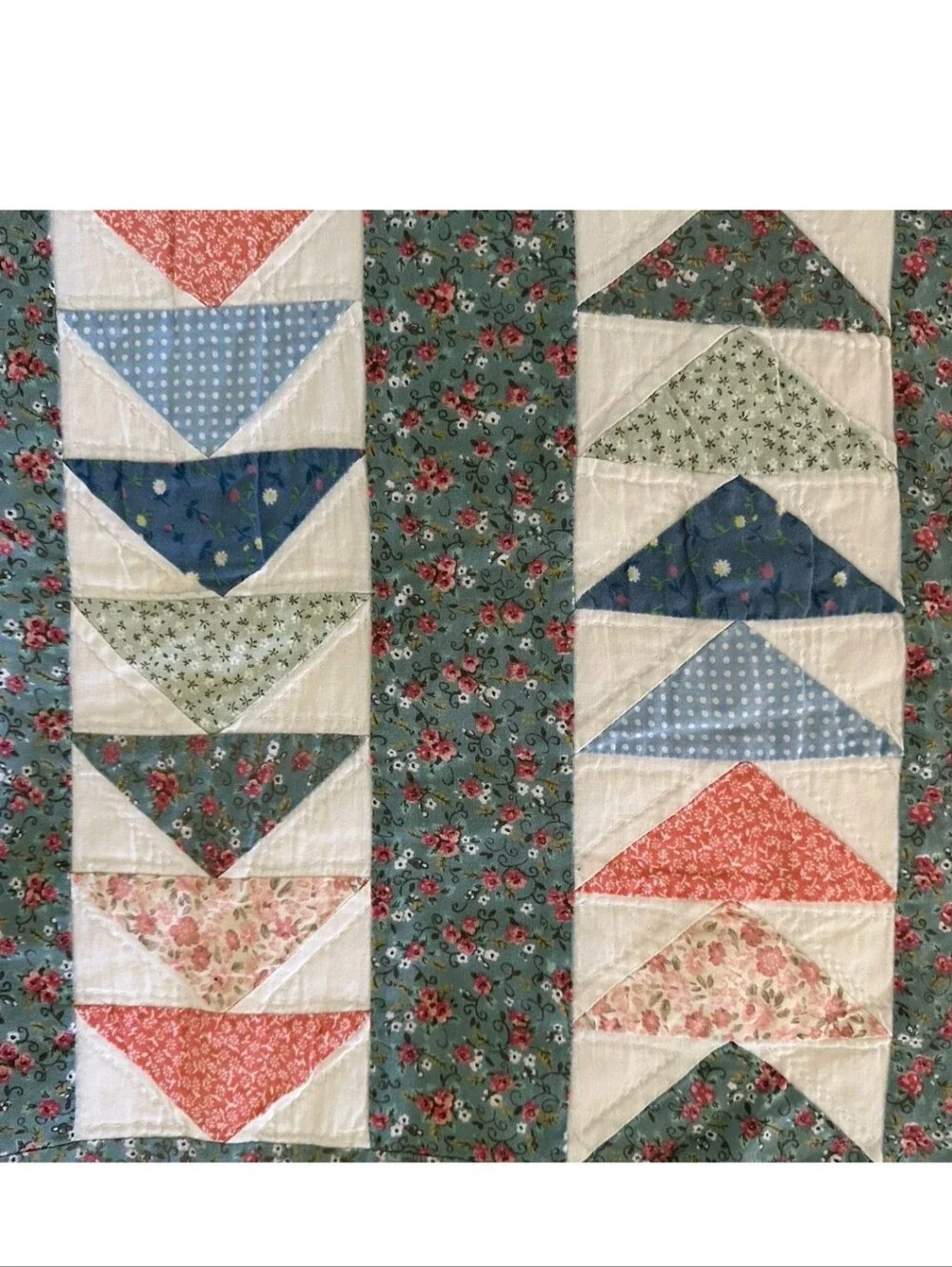 Vintage handmade flying geese quilt